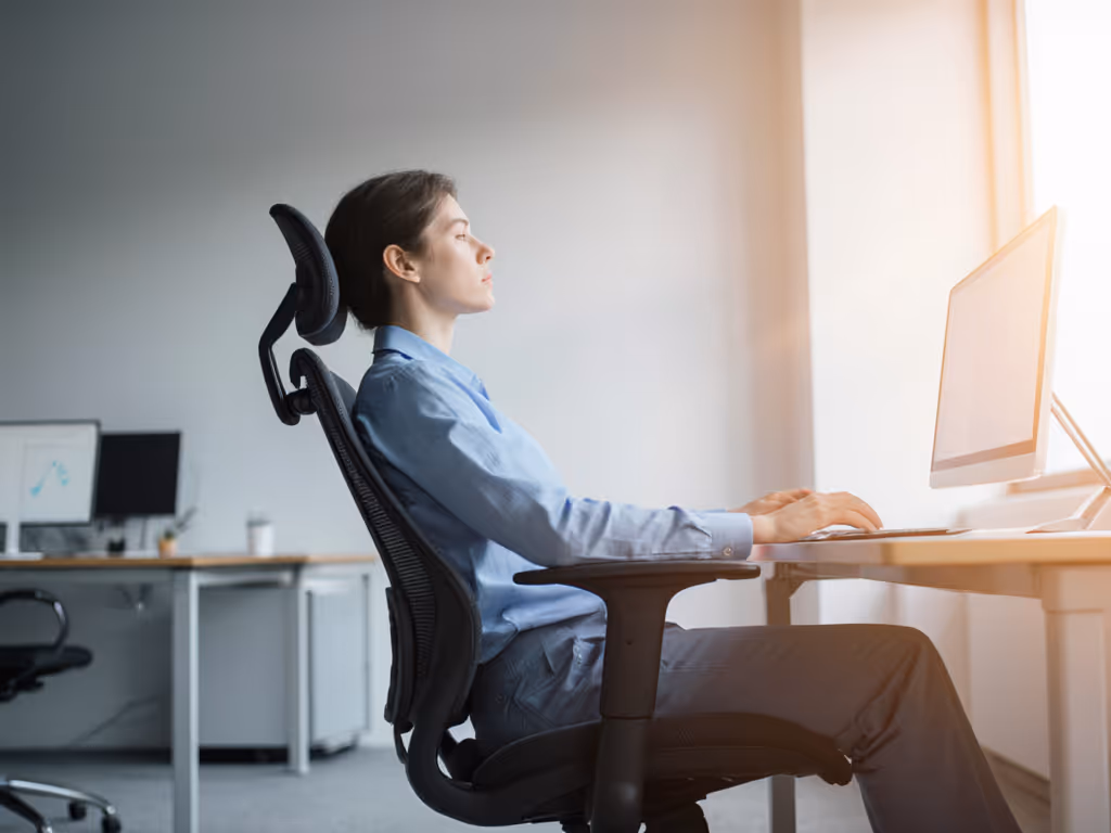 office_worker_comfortably_sitting_in_ergonomic_chair